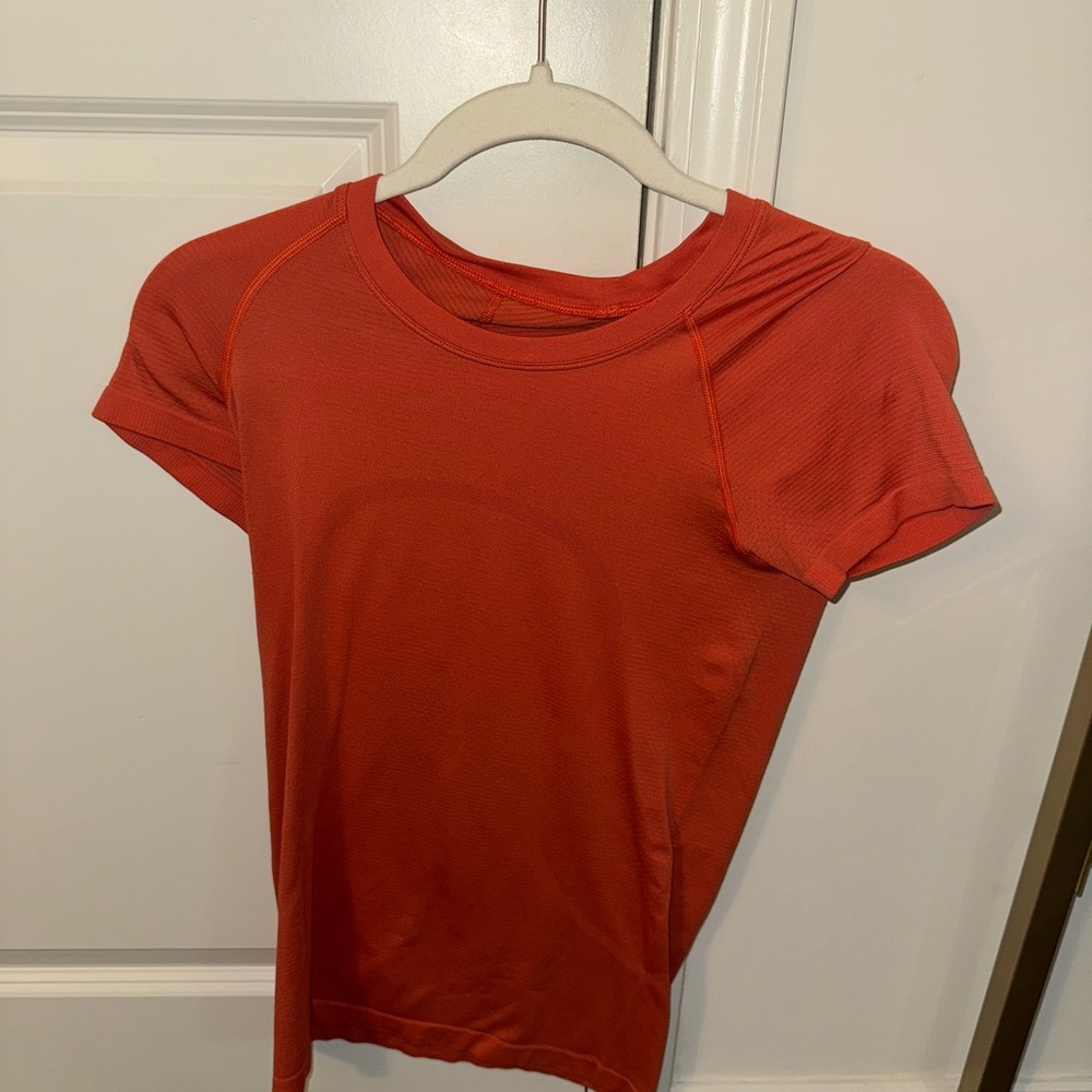 Lululemon athletica swiftly tech size 4 orange/coral color
